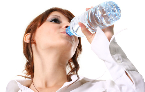 woman-drinking-water-from-a-bottle